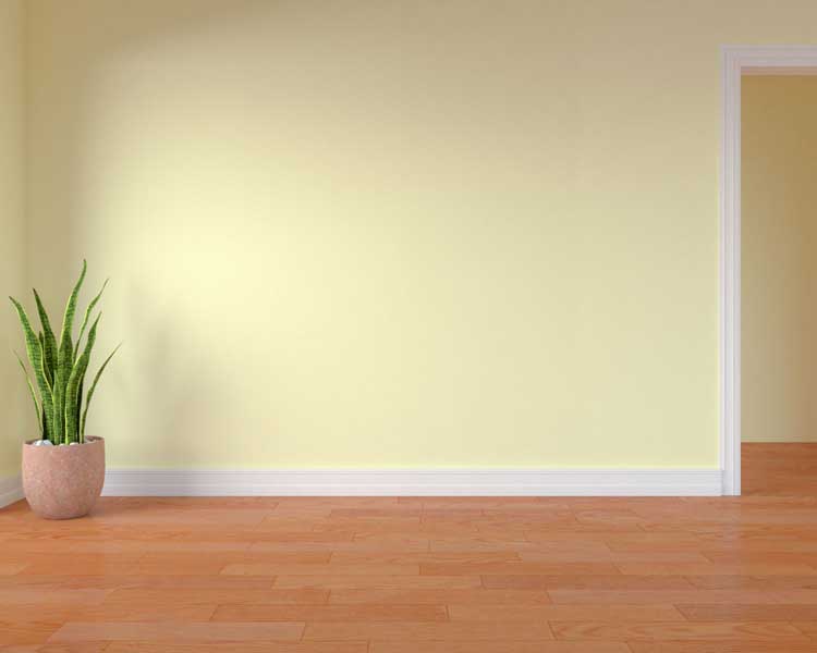 Tường sơn màu vàng nhạt kết hợp với sàn gỗ, sàn nhựa giả gỗ cam nâu